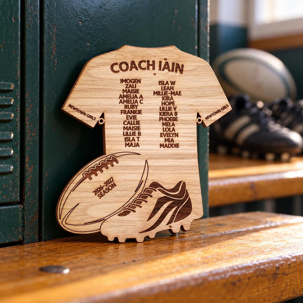 Personalised wooden rugby coach gift plaque with coach and player names on a rugby shirt design, featuring rugby ball and boot details.