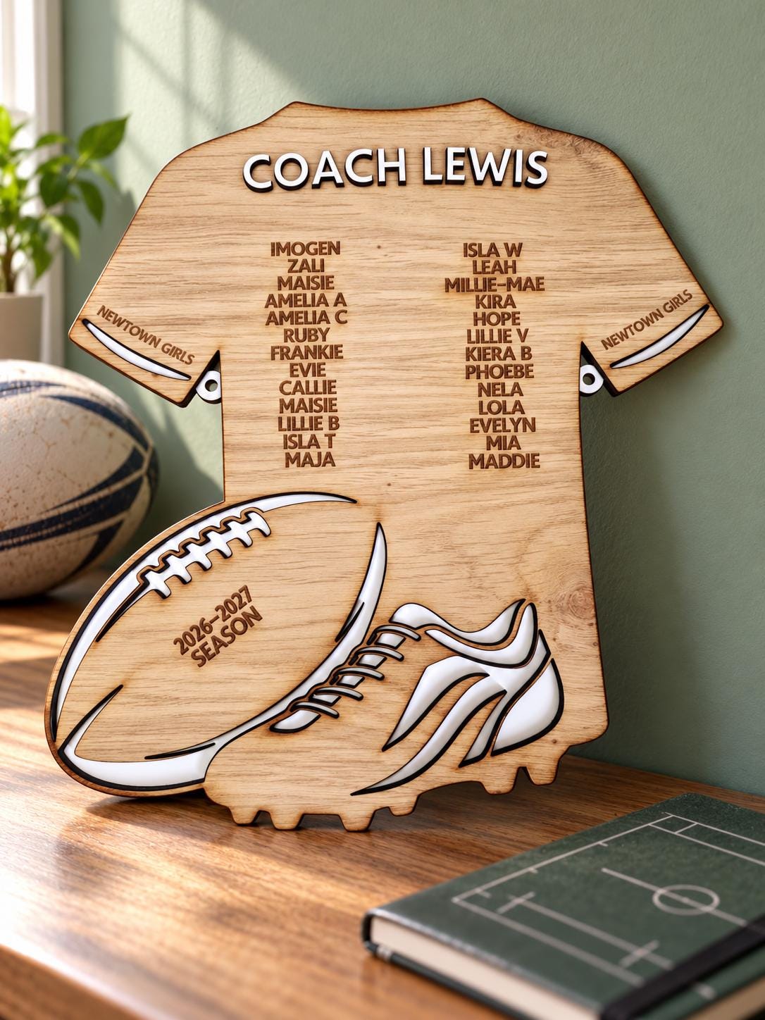 Personalised wooden rugby coach gift plaque with coach and player names on a rugby shirt design, featuring rugby ball and boot details.